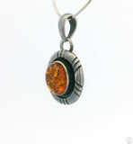 Small Vintage Sterling Silver Pendant with Baltic Amber Cabochon