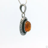 Small Vintage Sterling Silver Pendant with Baltic Amber Cabochon