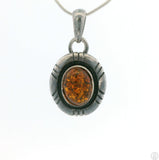 Small Vintage Sterling Silver Pendant with Baltic Amber Cabochon