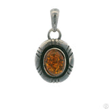 Small Vintage Sterling Silver Pendant with Baltic Amber Cabochon