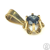 Vintage 10k Yellow Gold Butter Cup Pendant with .2 carat Topaz London Blue