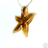 Vintage 14k Gold Starfish Pendant with Emerald