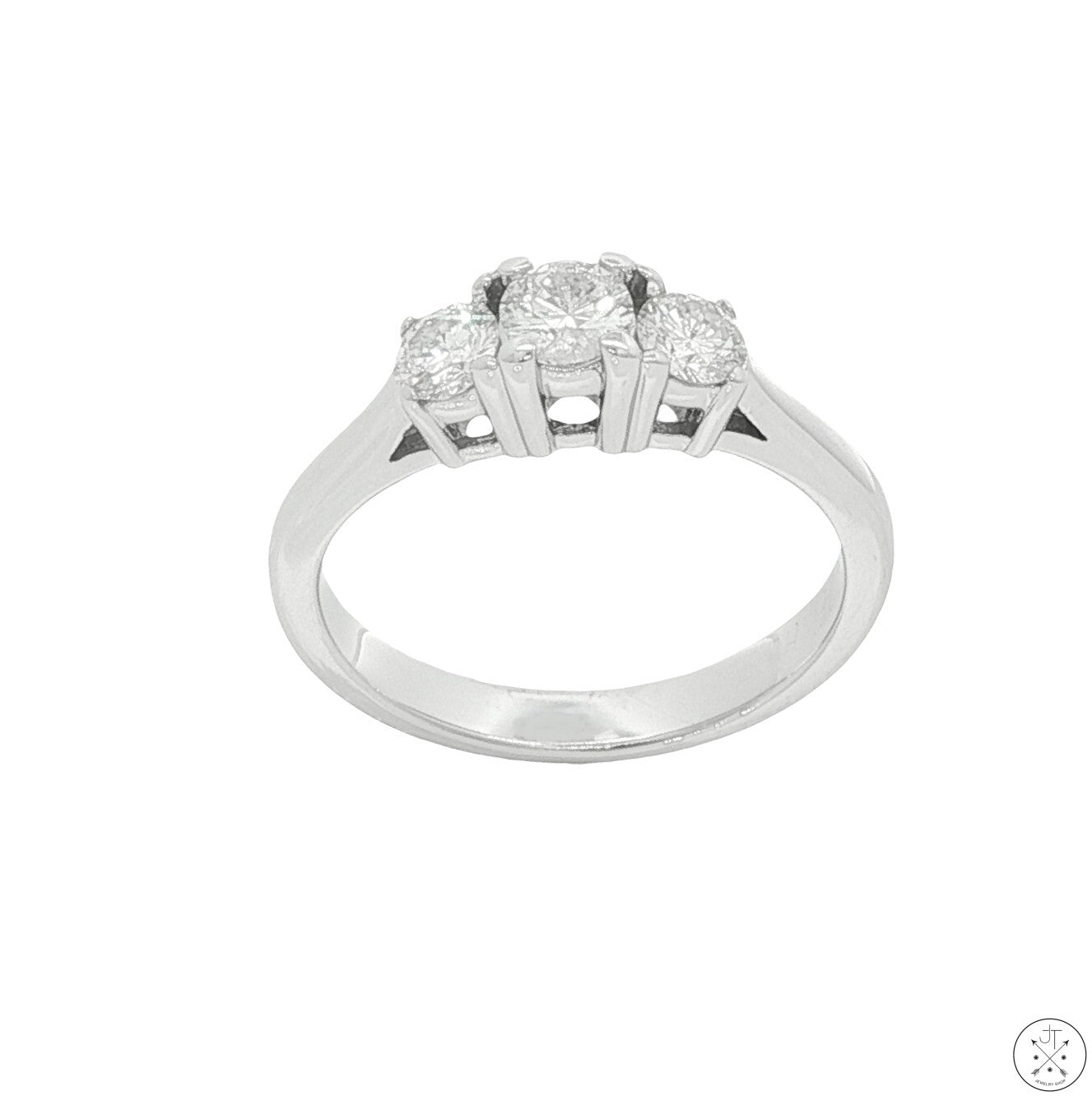 Silver ring with three diamonds on a white background