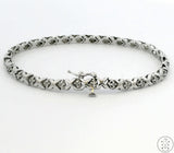 10k White Gold Tennis XO Bracelet with 1/4 ctw Diamonds 6.5 Inch