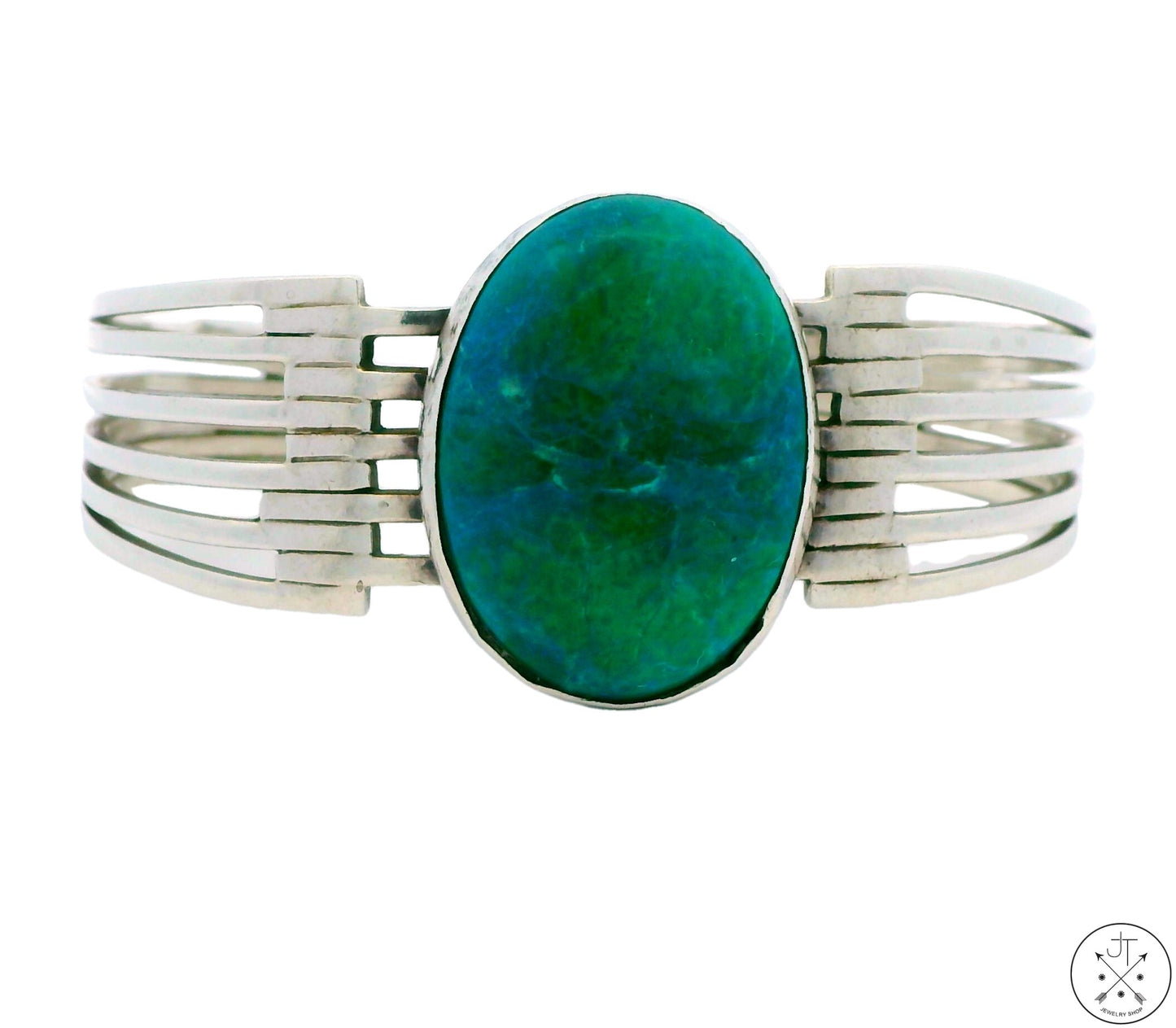 A vintage sterling silver cuff bracelet with a blue and green chrysocolla cabochon centerpiece, surrounded by a silver bracelet with stamped 'mexico 925 tp-112' on a white background.