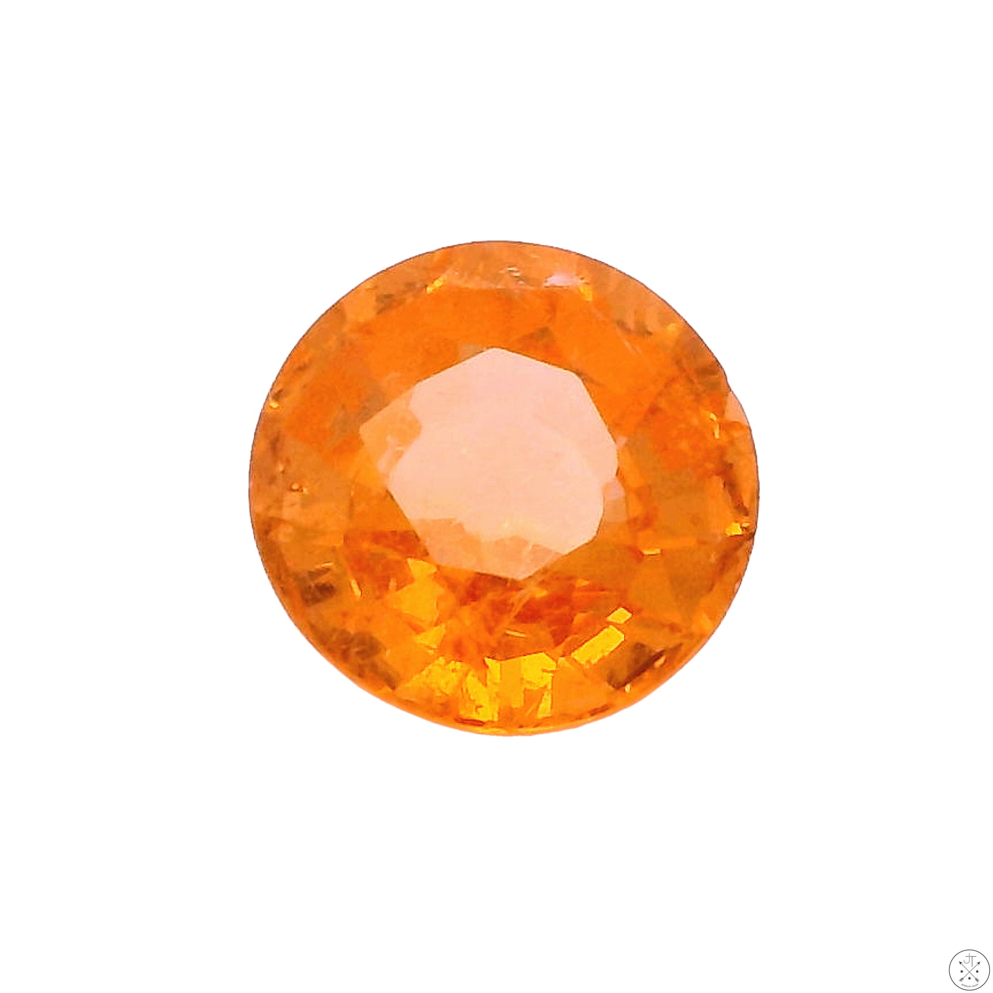 A faceted round natural Spessartine Garnet gemstone with a pale orange color.
