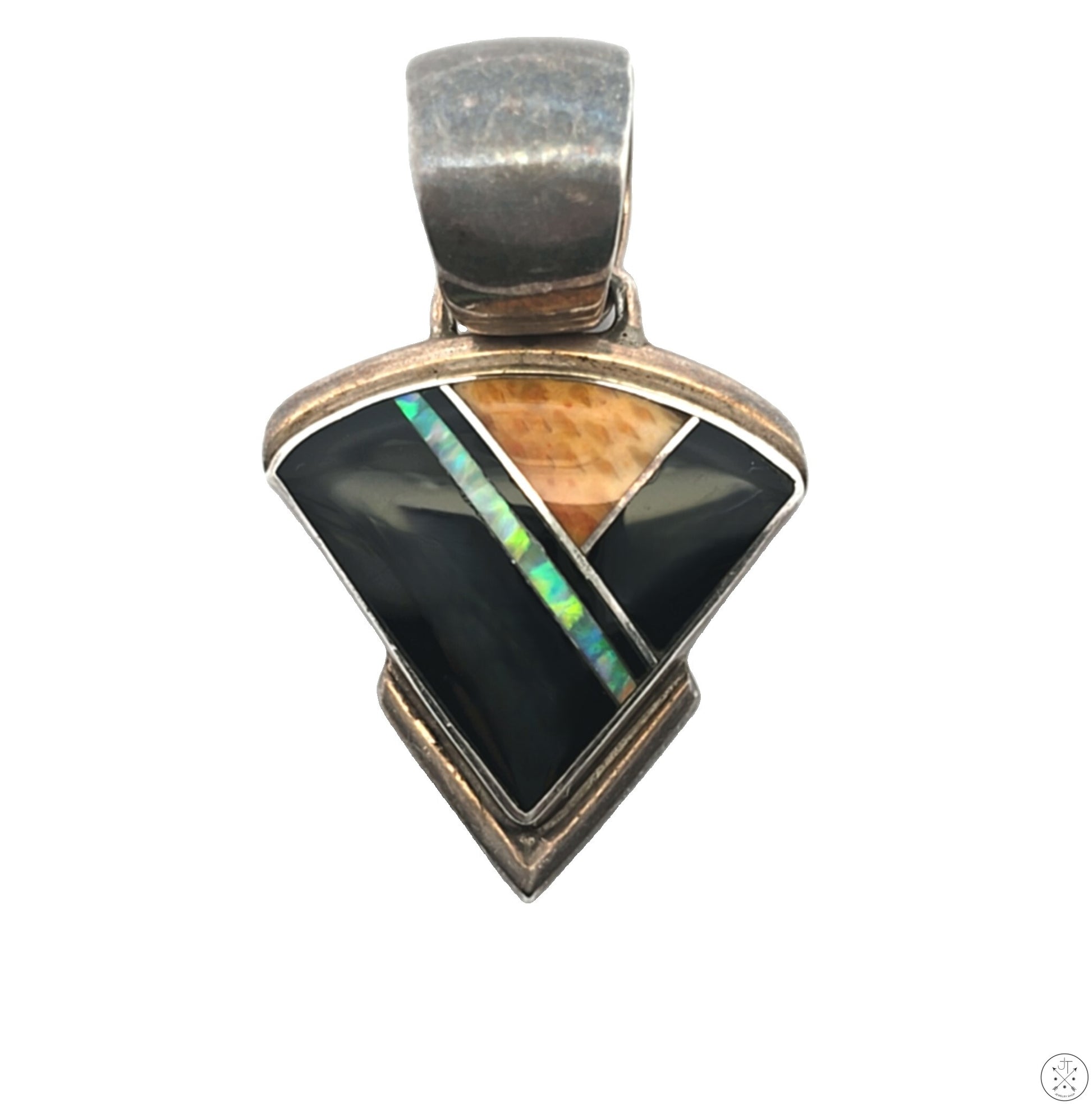 Vintage Navajo sterling silver pendant featuring a geometric pattern with onyx and opal inlays, signed by silversmith Albert Francisco.