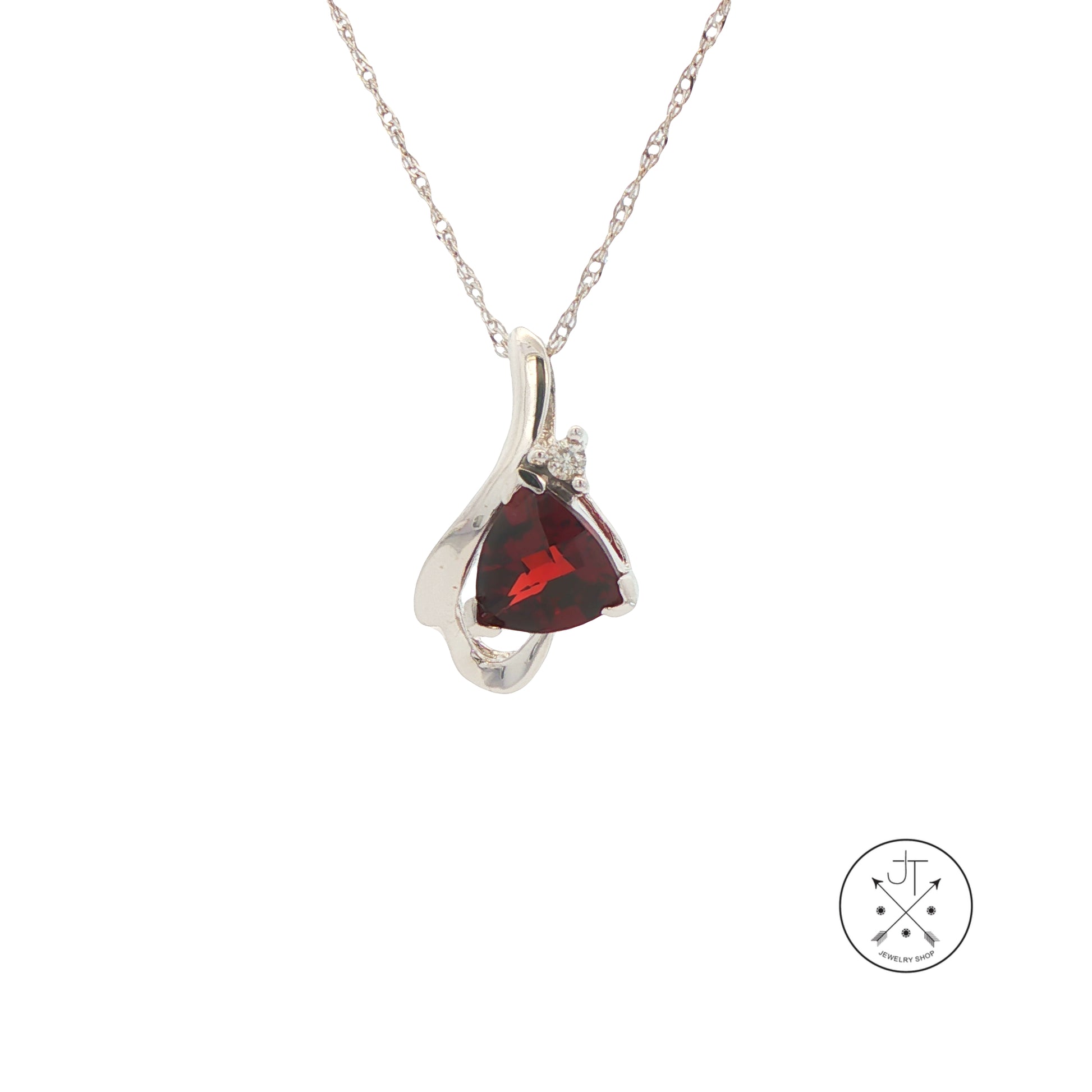 White Gold pendant necklace with a red garnet gemstone on a white background