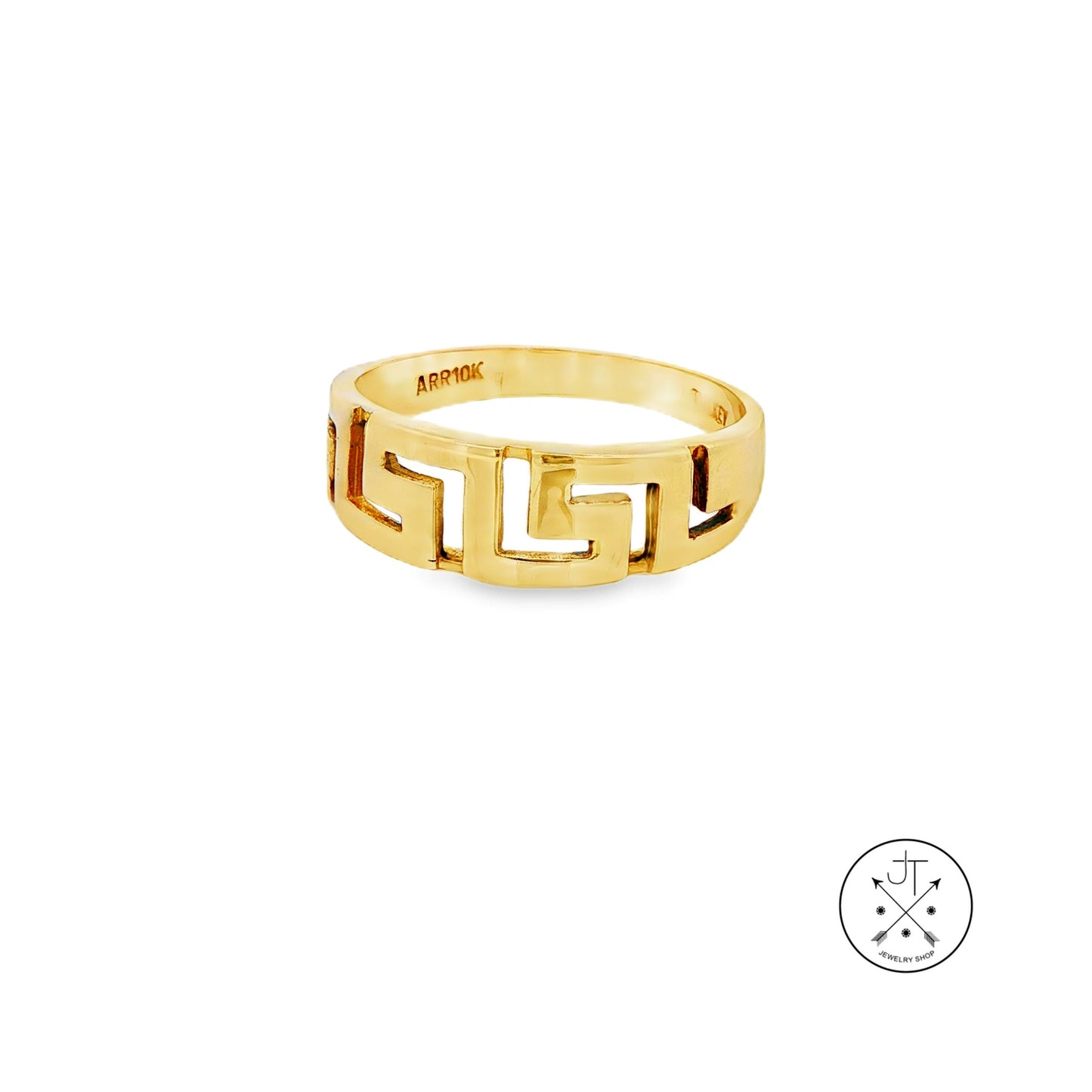 Gold ring with geometric design on a white background