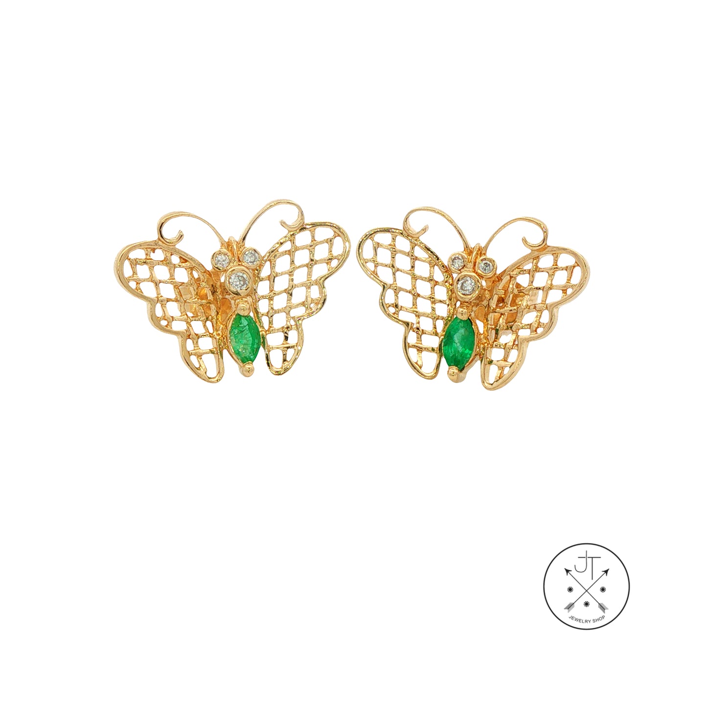 Gold butterfly earrings with green gemstones on a white background
