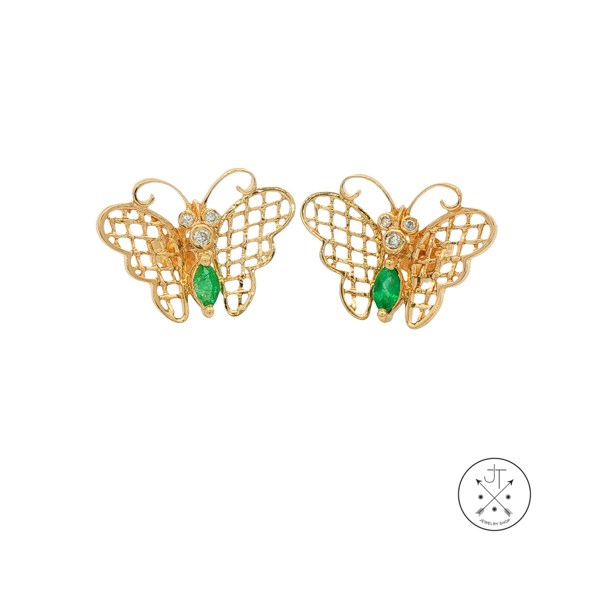 Gold butterfly earrings with green gemstones on a white background