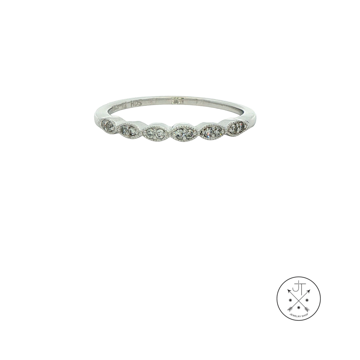 A 14k White Gold eternity ring featuring a row of small round-cutdiamonds, shown against a plain white background with a circular brand logo in the bottom right corner.